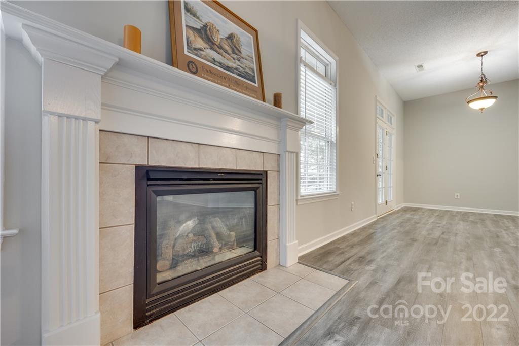1307 Crown Ridge Drive Fort Mill, SC 29708 - Photo 6 of 24 a view of an empty room with a fireplace