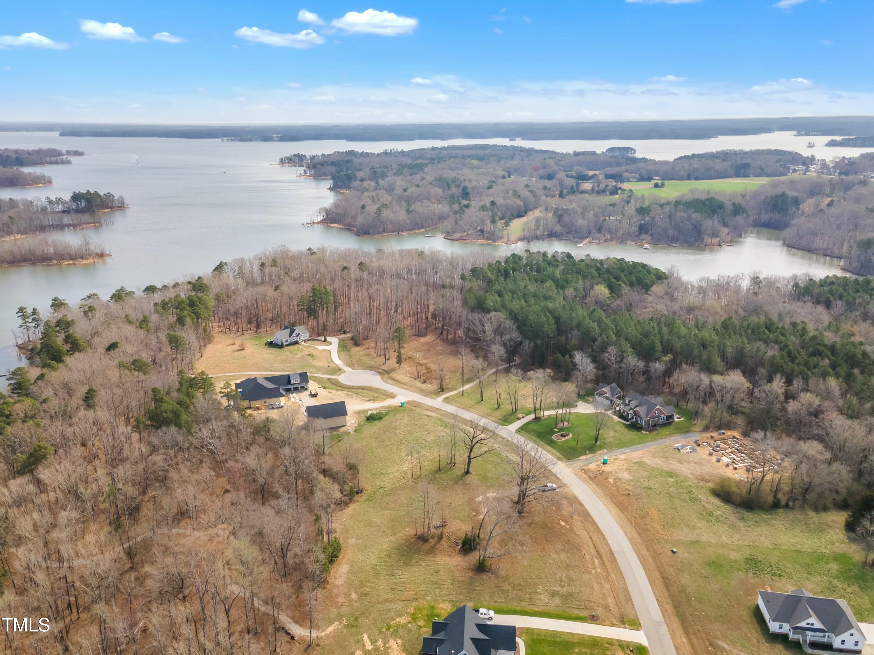 32 Waterstone Lane Henderson, NC 27537 - Photo 11 of 19 a view of a lake with a mountain