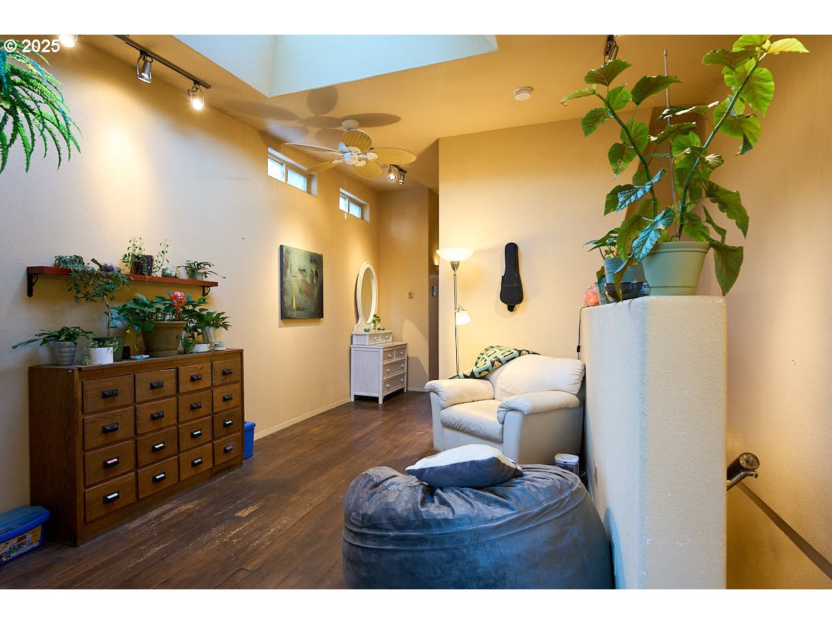 105 East Main Street Enterprise, OR 97828 - Photo 12 of 28 a living room with furniture and a potted plant