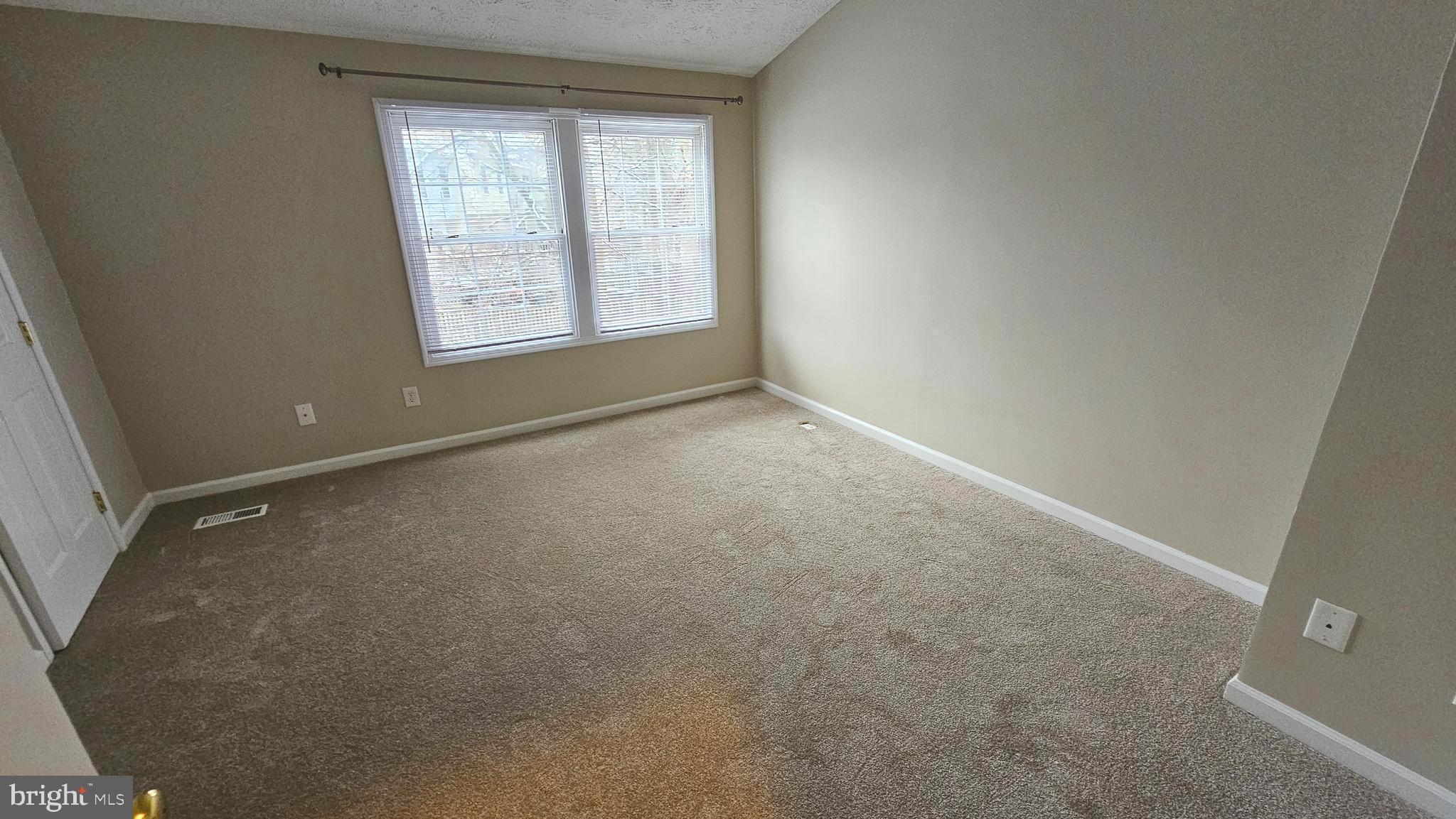 1196 Swanhill Court Chestnut Hill Cove, MD 21226 - Photo 12 of 32 an empty room with windows