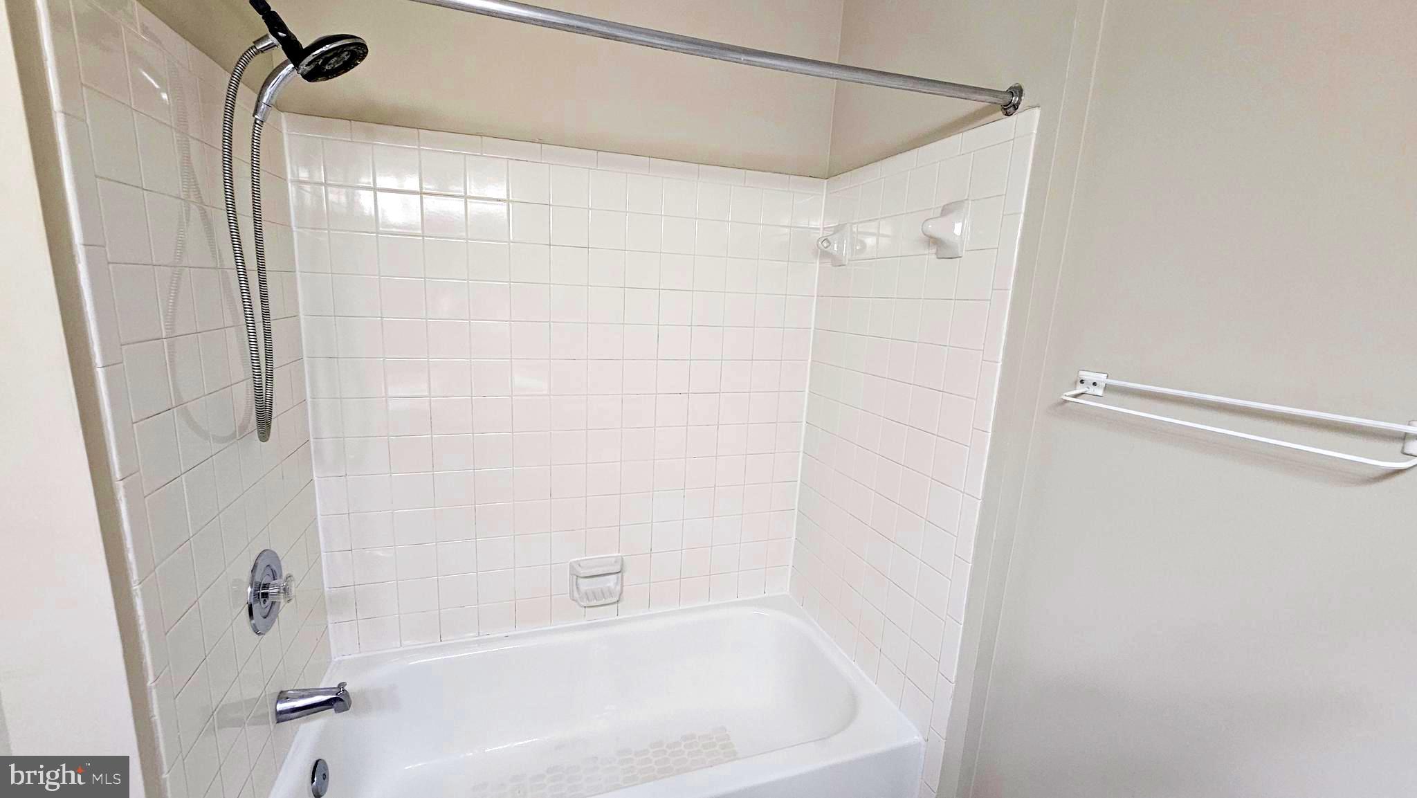 1196 Swanhill Court Chestnut Hill Cove, MD 21226 - Photo 18 of 32 a bathroom with a shower and a bath tub