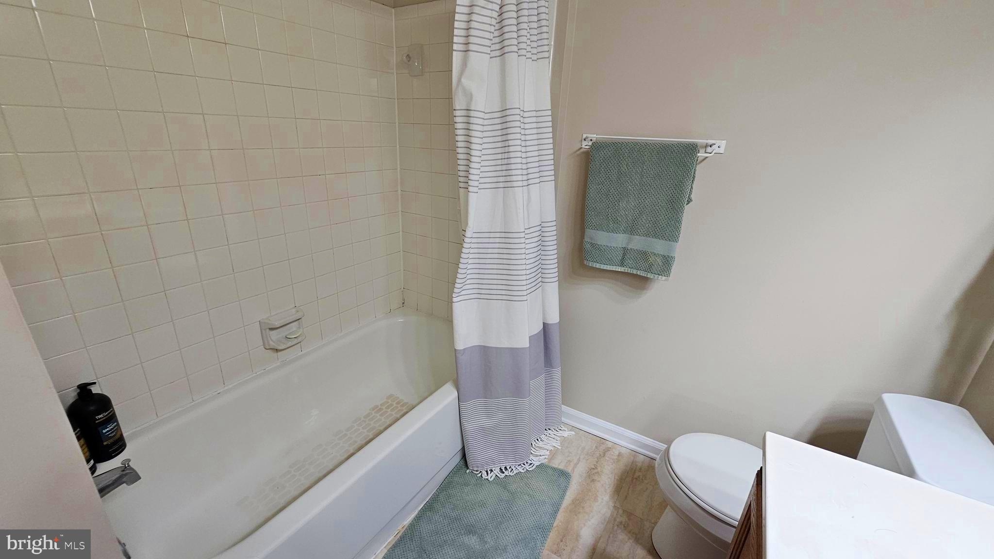 1196 Swanhill Court Chestnut Hill Cove, MD 21226 - Photo 19 of 32 a bathroom with a bathtub and toilet