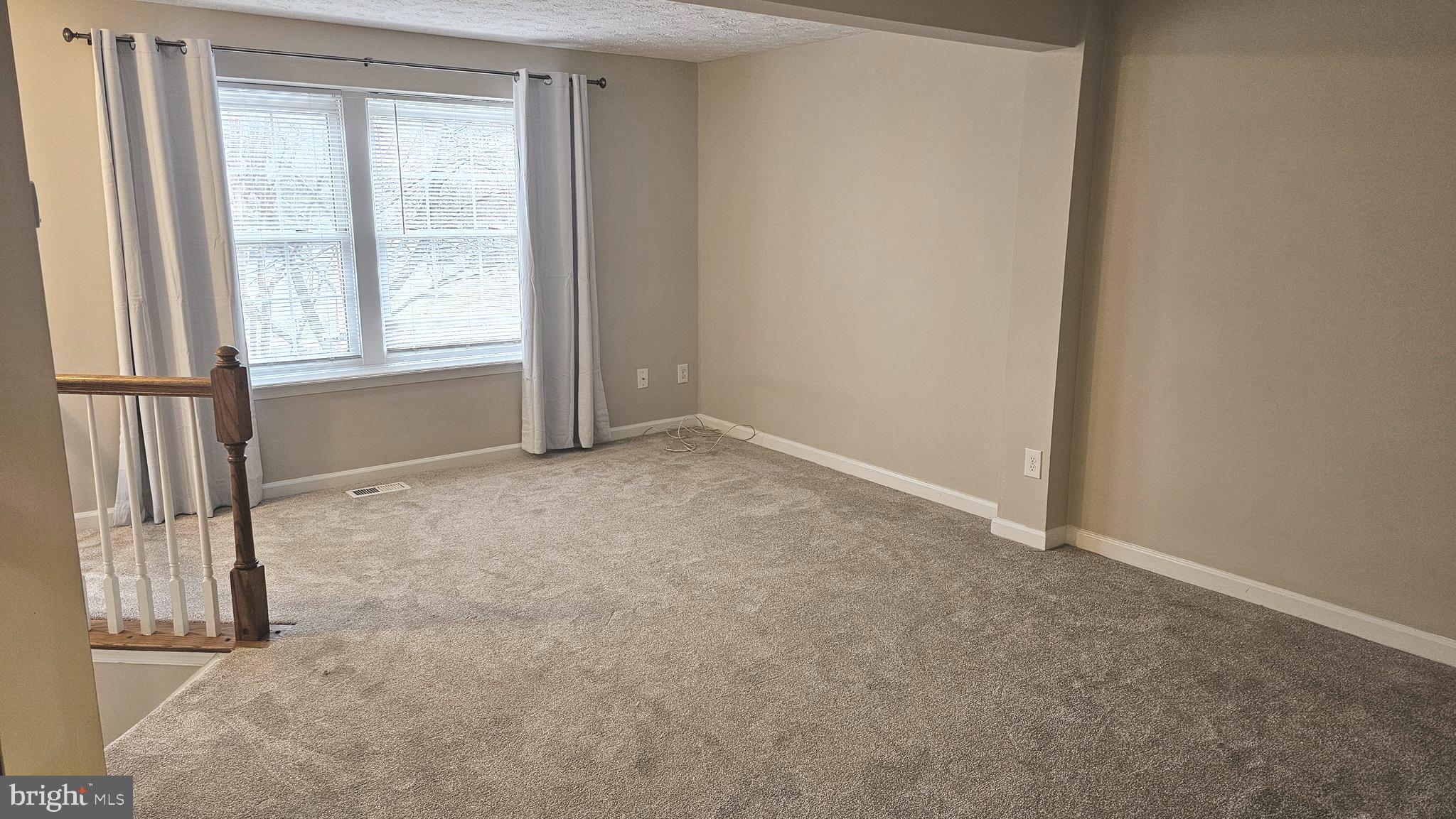 1196 Swanhill Court Chestnut Hill Cove, MD 21226 - Photo 3 of 32 an empty room with a empty space and a window