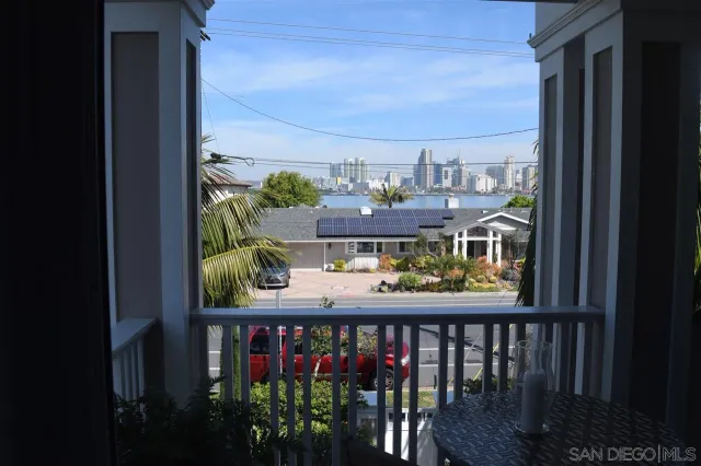 a view of a street from a balcony