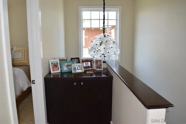 a kitchen with a sink and refrigerator