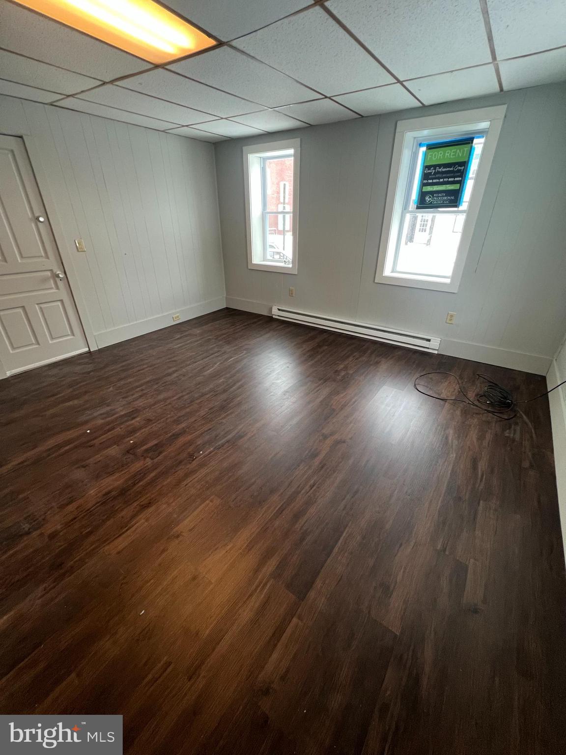 544 North 8th Street, Unit 2 Lebanon, PA 17046 - Photo 4 of 7 an empty room with wooden floor and windows