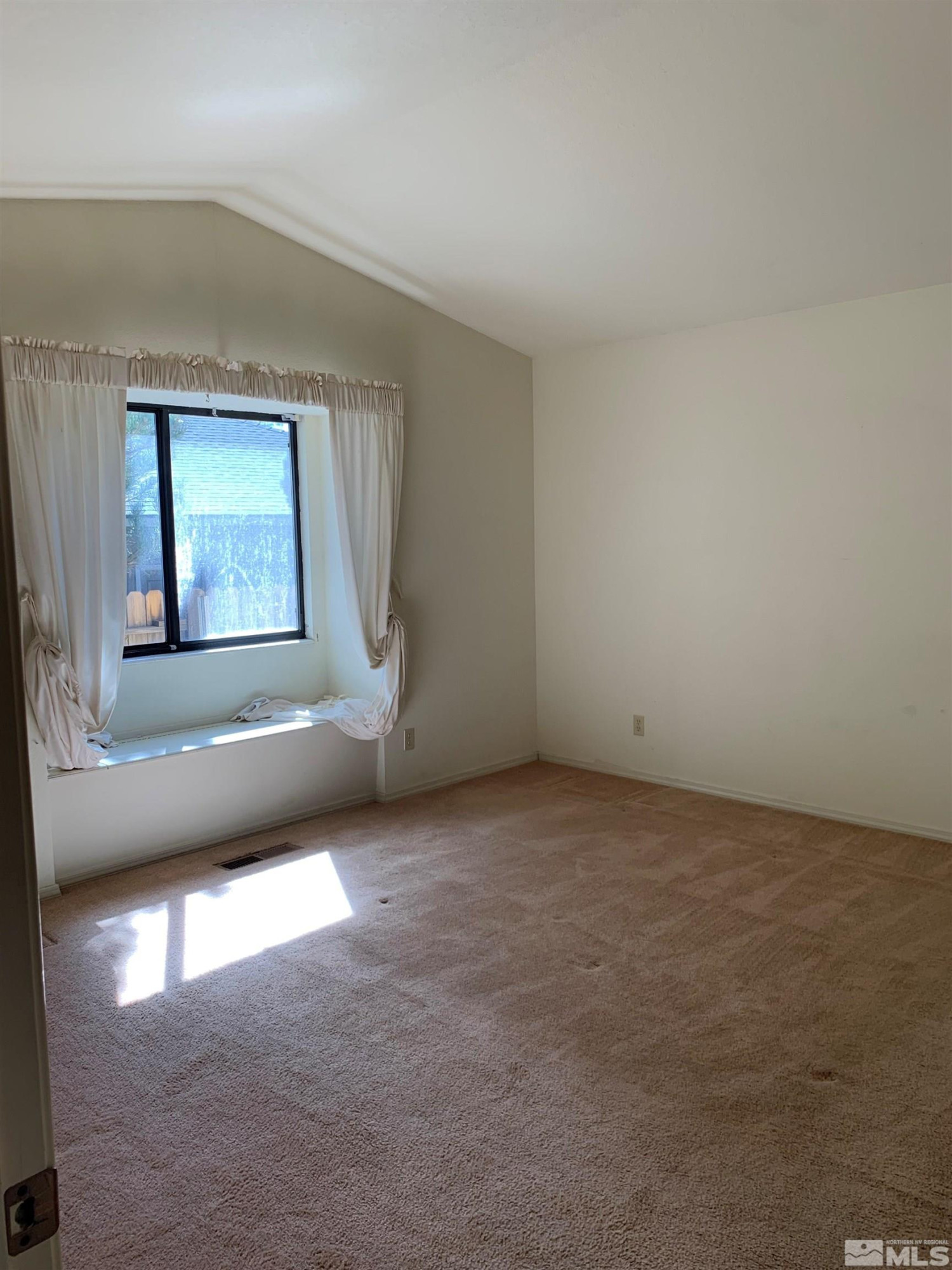 5261 Coit Drive Reno, NV 89523 - Photo 6 of 11 an empty room with windows