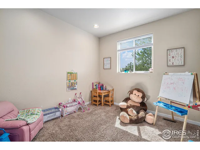 a room with toys and wooden floor
