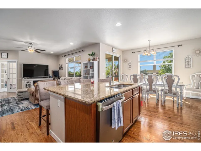 a kitchen with lots of counter top space and dining table