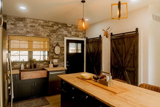 a view of a livingroom with furniture and fireplace