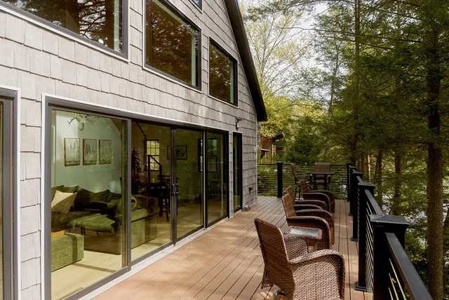 a view of living room with furniture and garden view
