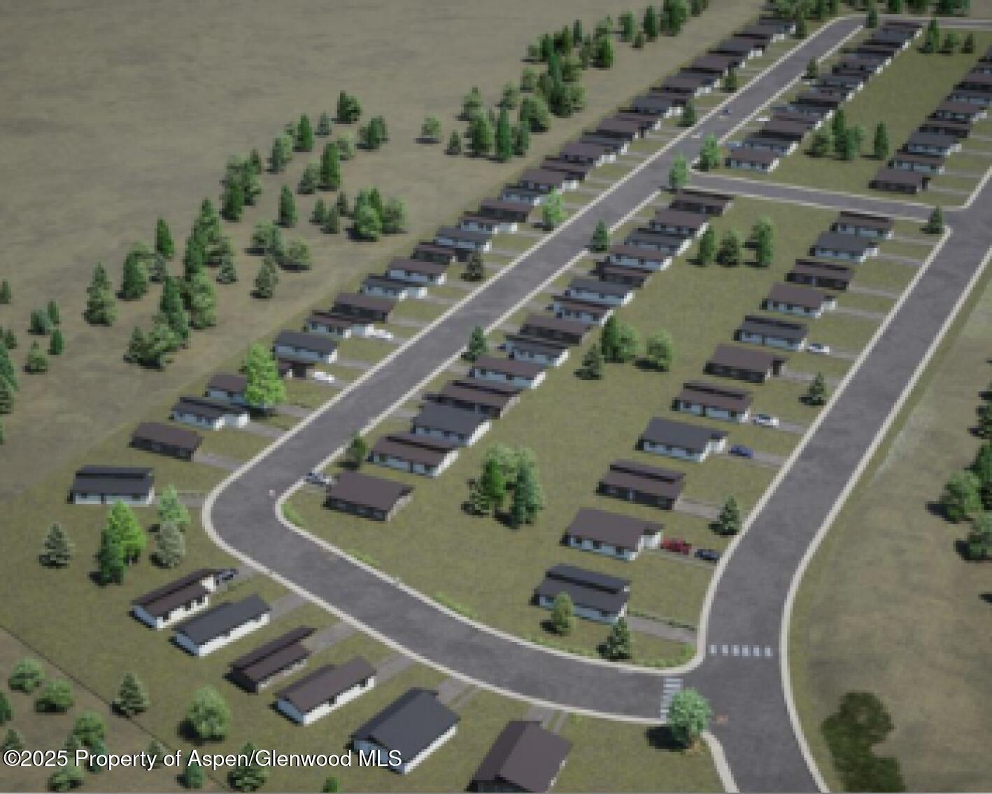 an aerial view of a residential houses with outdoor space