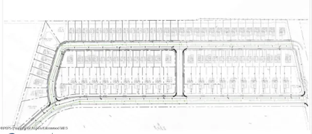 a black and white photo of a living room