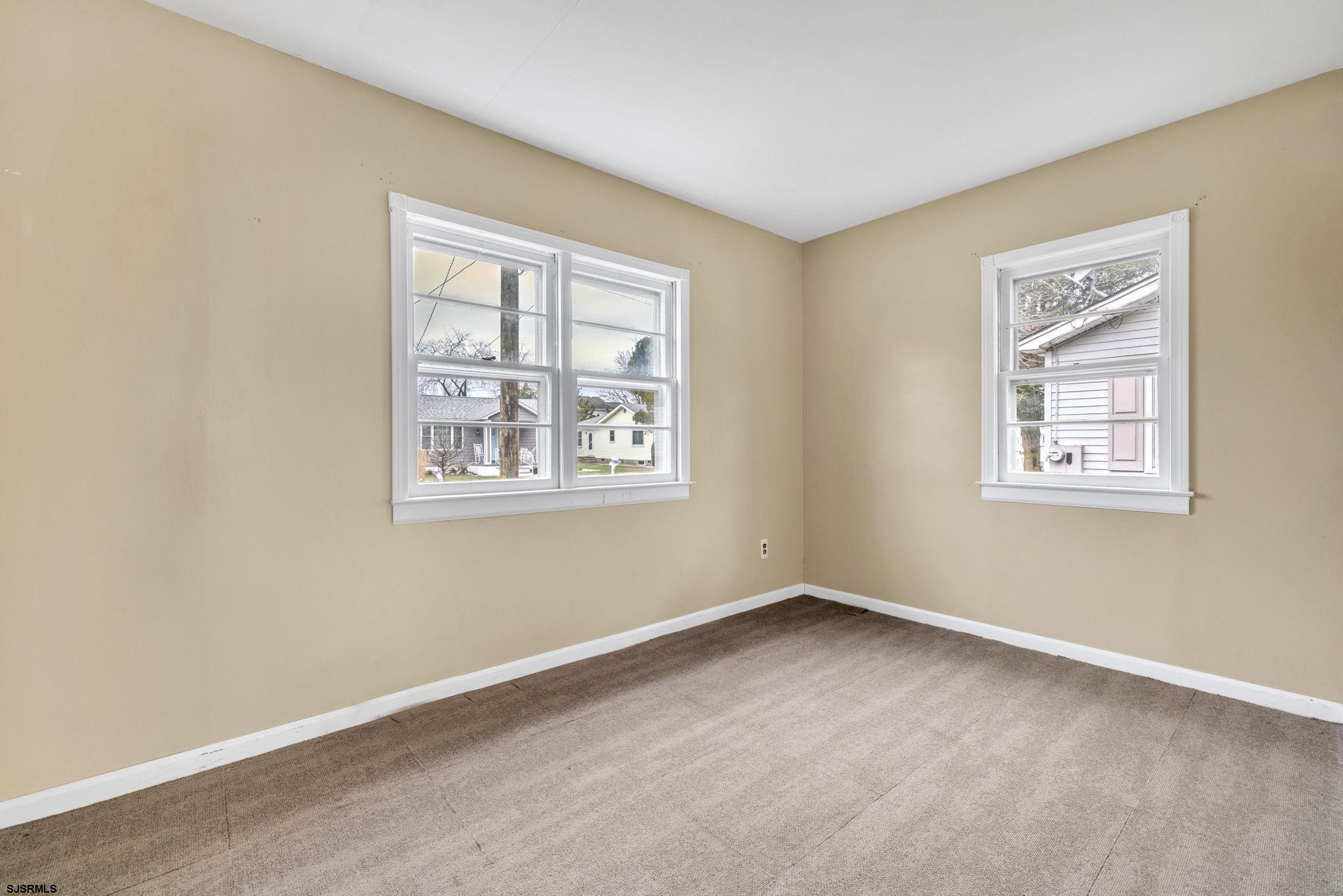 19 Arbor Road Villas, NJ 08251 - Photo 11 of 33 an empty room with windows