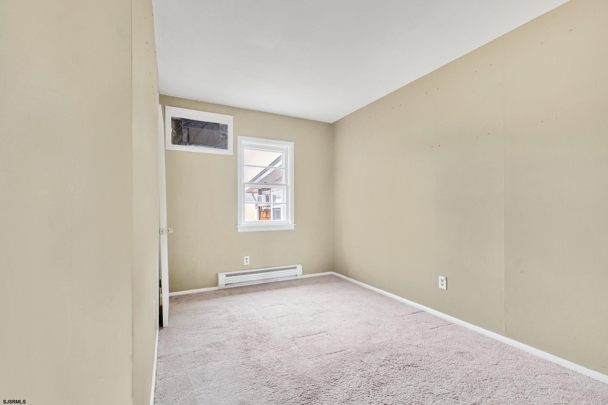 19 Arbor Road Villas, NJ 08251 - Photo 12 of 33 an empty room with windows