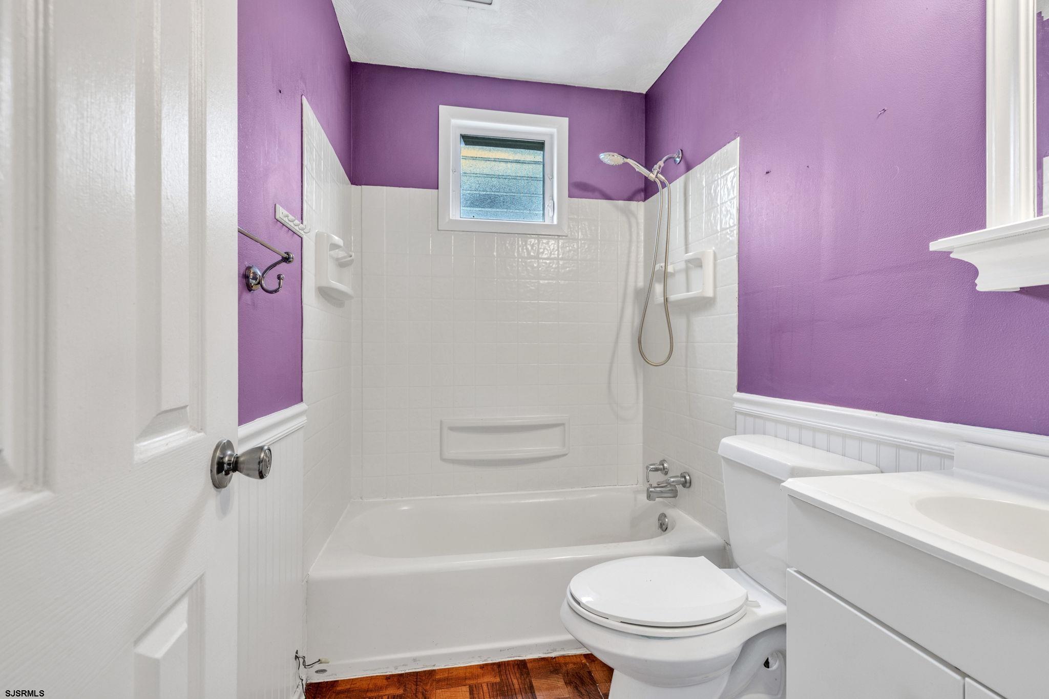 19 Arbor Road Villas, NJ 08251 - Photo 15 of 33 a bathroom with a granite countertop toilet a sink and a bathtub