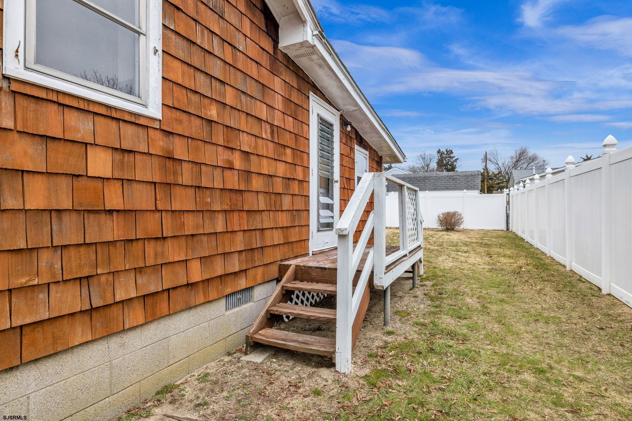 19 Arbor Road Villas, NJ 08251 - Photo 2 of 33 a view of staircase with white walls and stairs