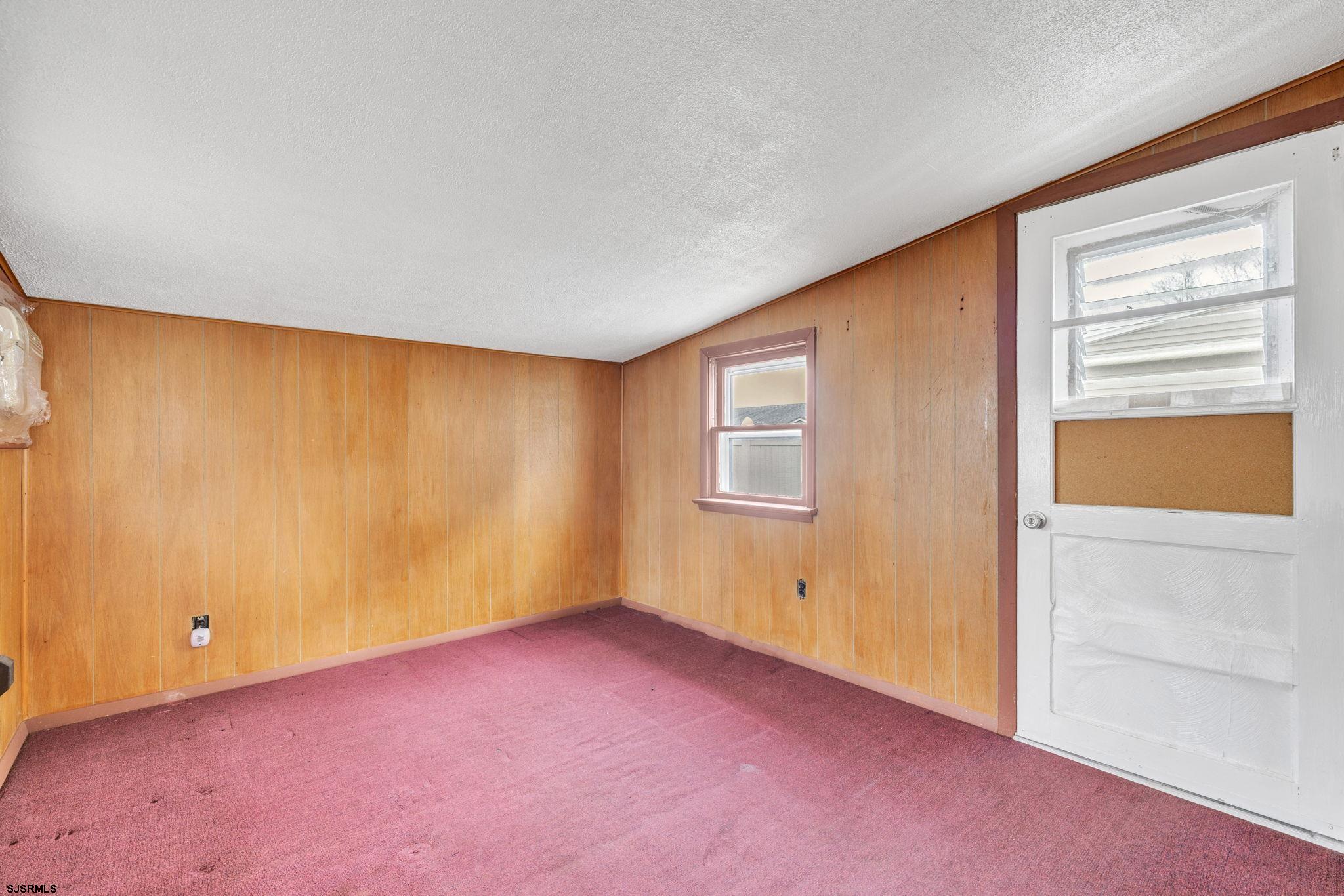 19 Arbor Road Villas, NJ 08251 - Photo 22 of 33 an empty room with windows