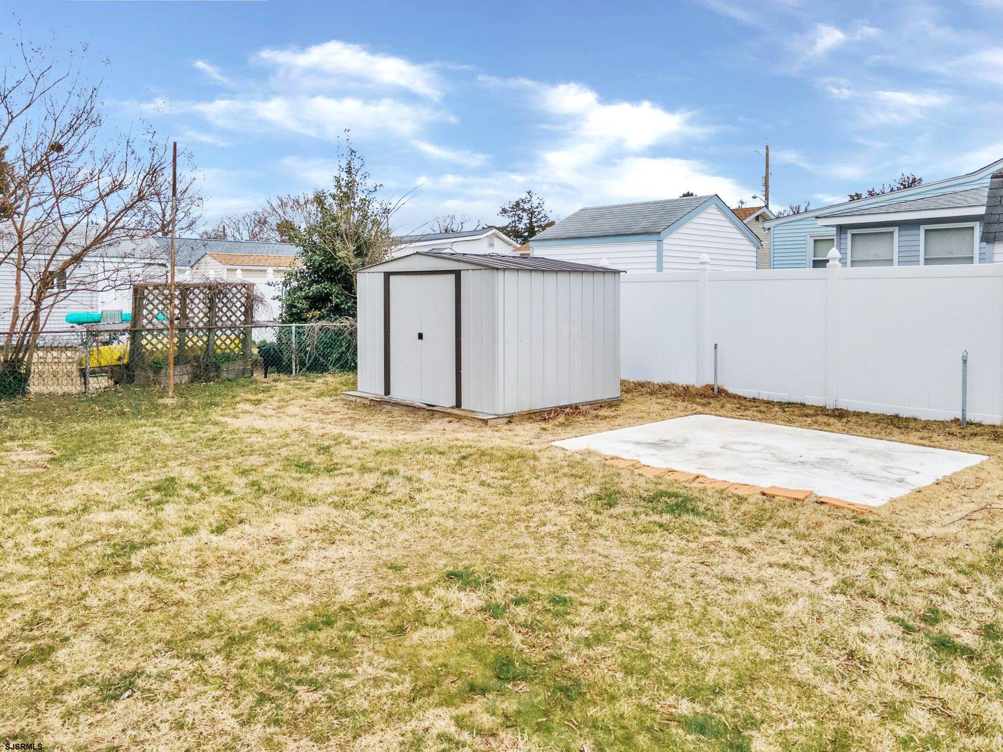 19 Arbor Road Villas, NJ 08251 - Photo 26 of 33 a view of a house with a yard