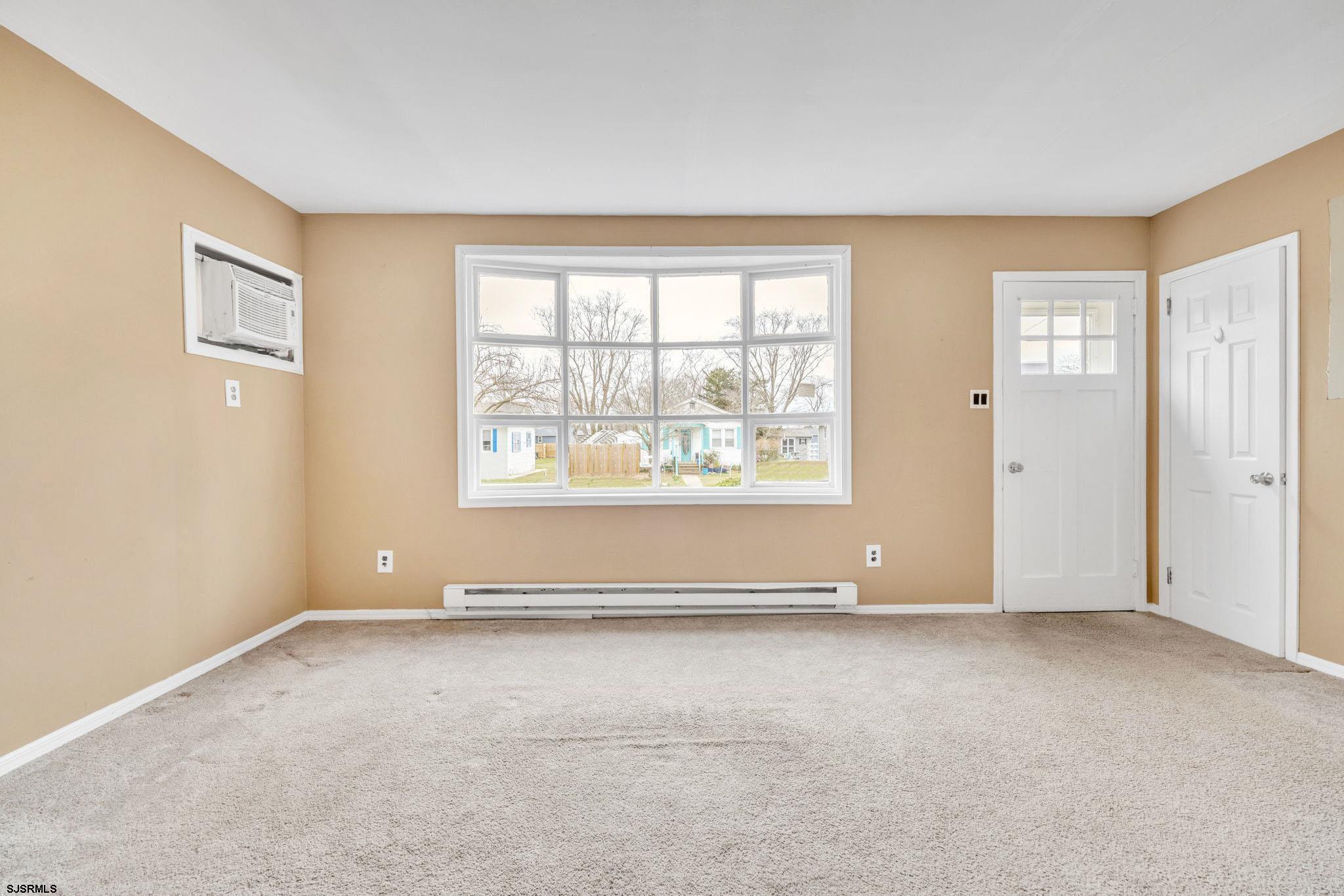 19 Arbor Road Villas, NJ 08251 - Photo 5 of 33 an empty room with window