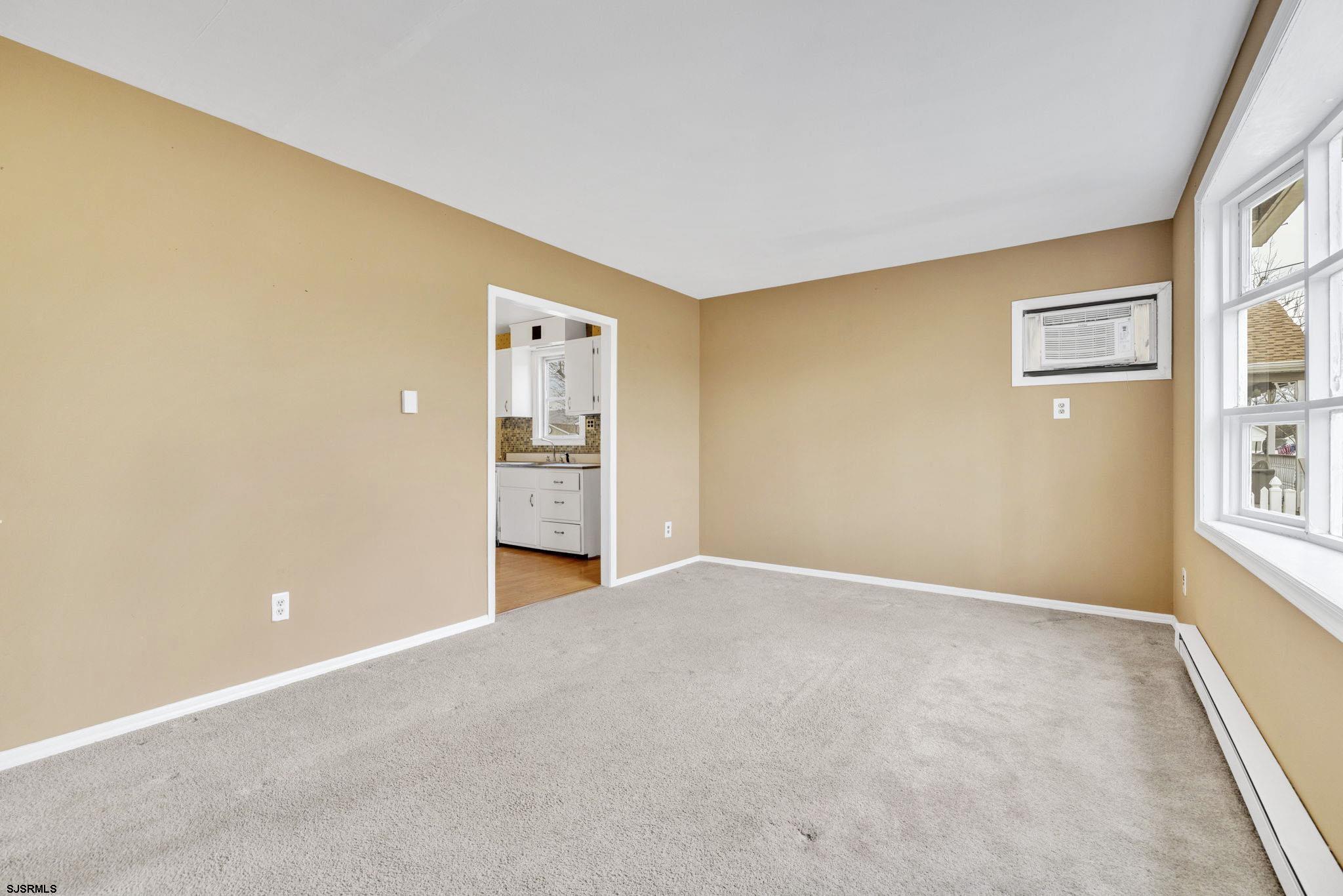 19 Arbor Road Villas, NJ 08251 - Photo 8 of 33 a view of an empty room with a window