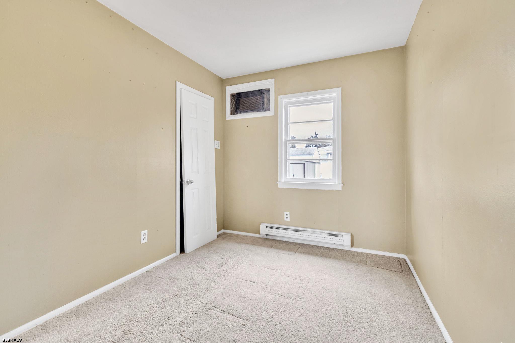 19 Arbor Road Villas, NJ 08251 - Photo 10 of 33 an empty room with windows