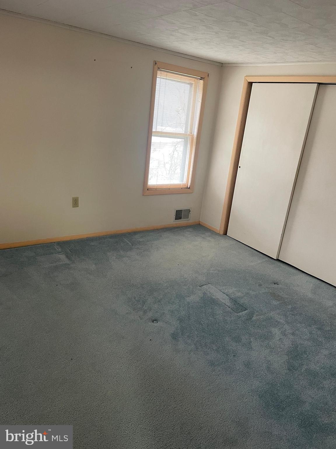 15607 Old Coney Cemetery Road Southwest Lonaconing, MD 21539 - Photo 25 of 34 an empty room with windows