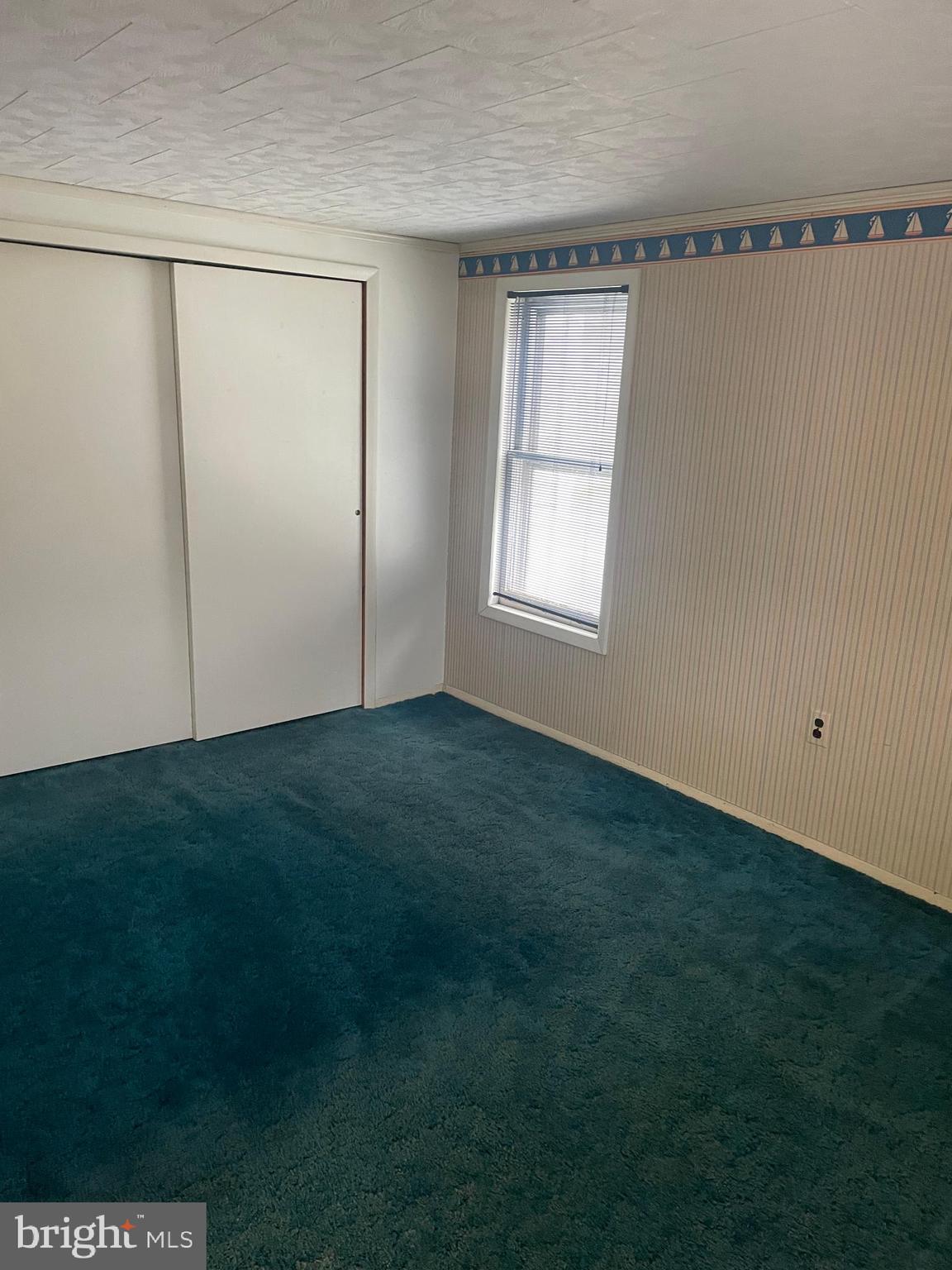 15607 Old Coney Cemetery Road Southwest Lonaconing, MD 21539 - Photo 30 of 34 a view of room with window and closet