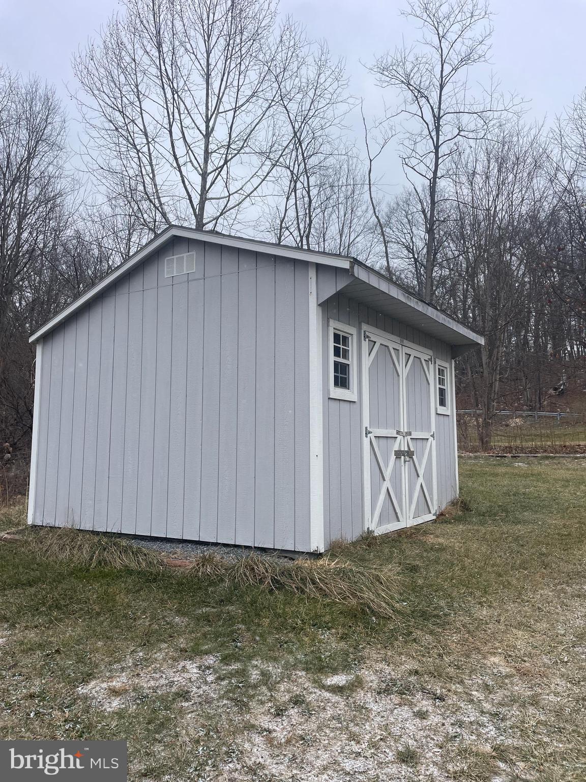 15607 Old Coney Cemetery Road Southwest Lonaconing, MD 21539 - Photo 33 of 34 a fire hydrant is sitting in the middle of a yard