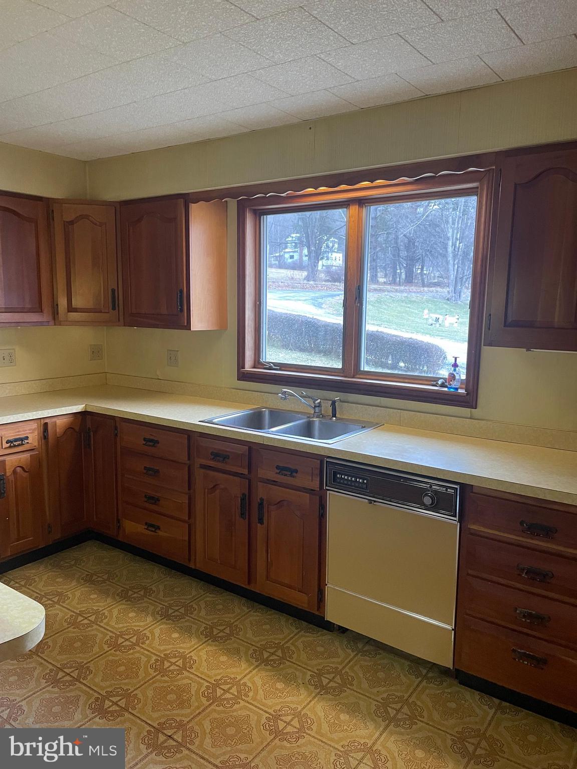 15607 Old Coney Cemetery Road Southwest Lonaconing, MD 21539 - Photo 8 of 34 a kitchen with stainless steel appliances granite countertop a sink and a cabinets