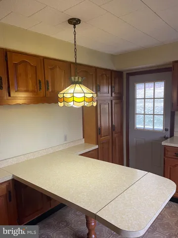 a utility room with cabinets