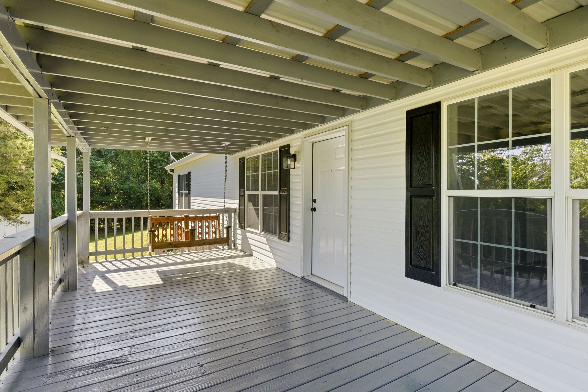1021 B Jordan Road Lascassas, TN 37085 - Photo 15 of 58 a view of a balcony with wooden floor