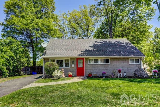 50 Ashley Road Edison, NJ 08817 - Photo 1 of 25 a view of house with backyard and garden