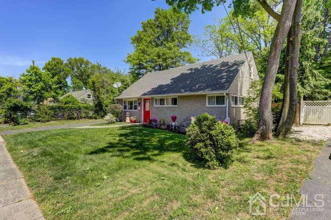 50 Ashley Road Edison, NJ 08817 - Photo 2 of 25 a view of a house with a yard