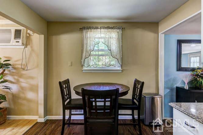 50 Ashley Road Edison, NJ 08817 - Photo 11 of 25 a view of a dining room with furniture and window