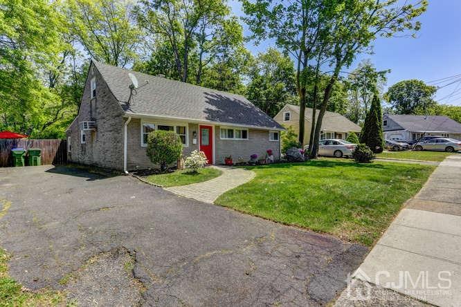 50 Ashley Road Edison, NJ 08817 - Photo 3 of 25 a front view of house with yard and green space