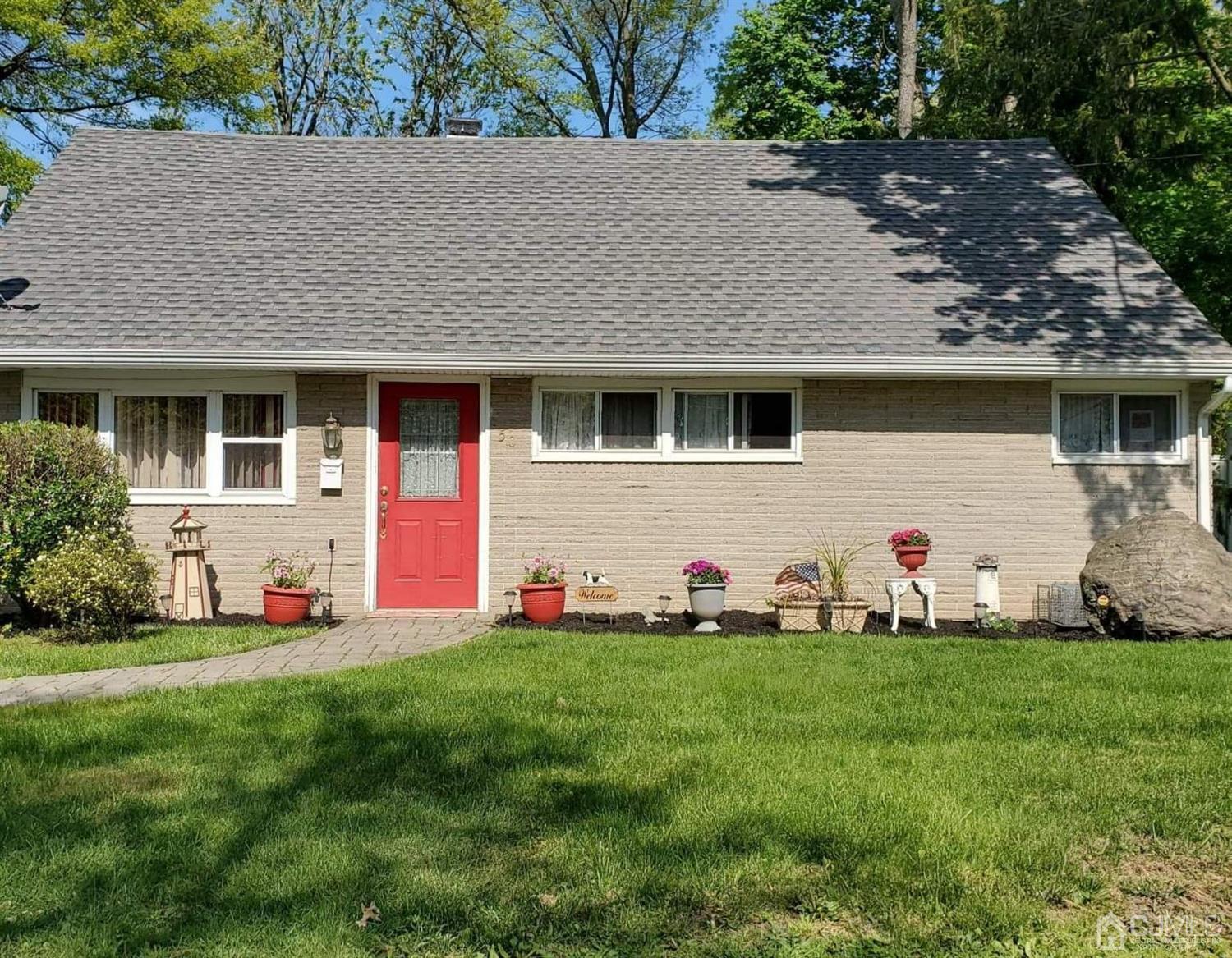 50 Ashley Road Edison, NJ 08817 - Photo 25 of 25 a front view of house with yard