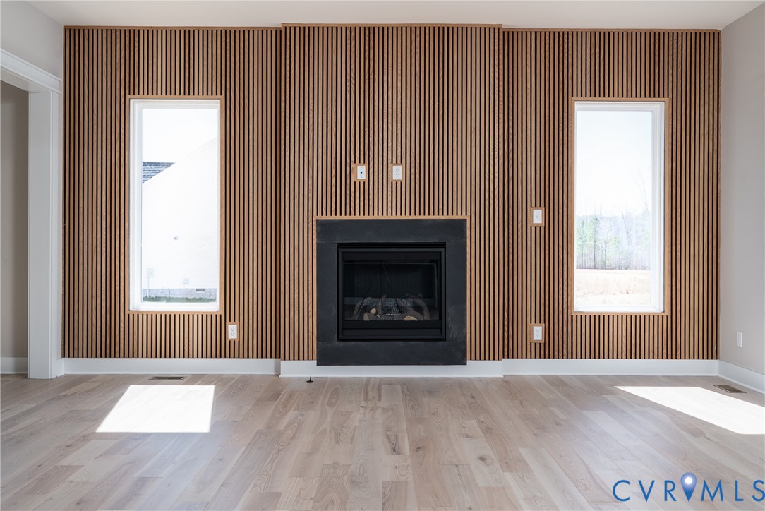 3536 Ampfield Way Midlothian, VA 23112 - Photo 15 of 49 an empty room with a fireplace and windows