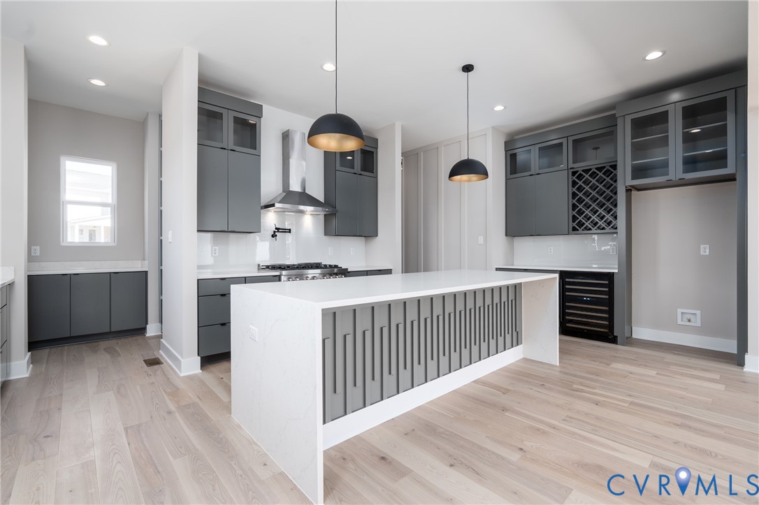 3536 Ampfield Way Midlothian, VA 23112 - Photo 20 of 49 a kitchen with stainless steel appliances kitchen island granite countertop a refrigerator a stove and a wooden floors