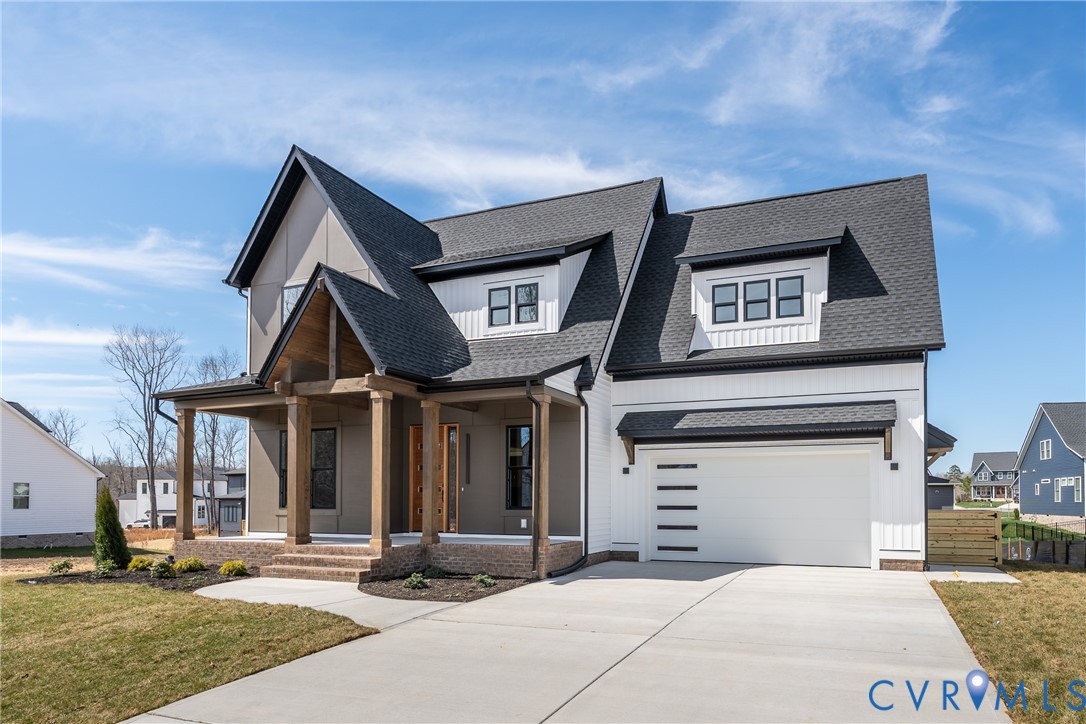 3536 Ampfield Way Midlothian, VA 23112 - Photo 2 of 49 a front view of a house with a garden