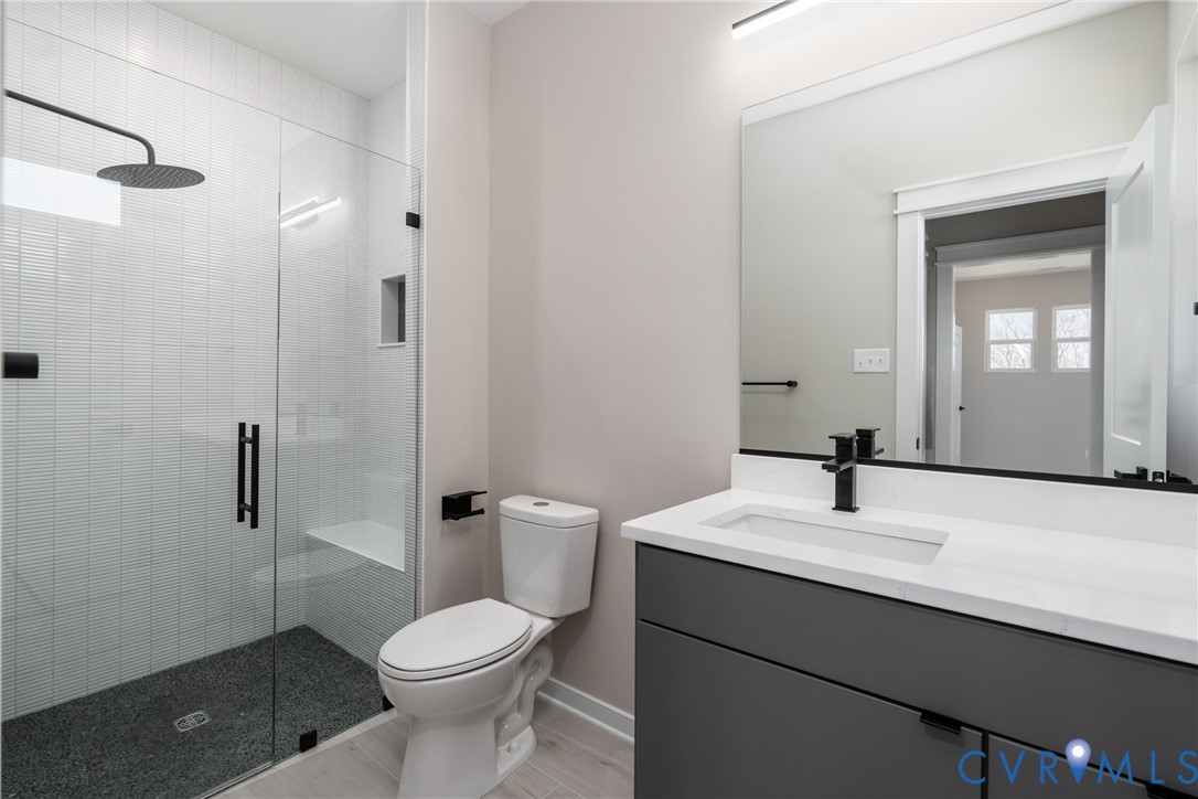 3536 Ampfield Way Midlothian, VA 23112 - Photo 33 of 49 a bathroom with a sink toilet and shower