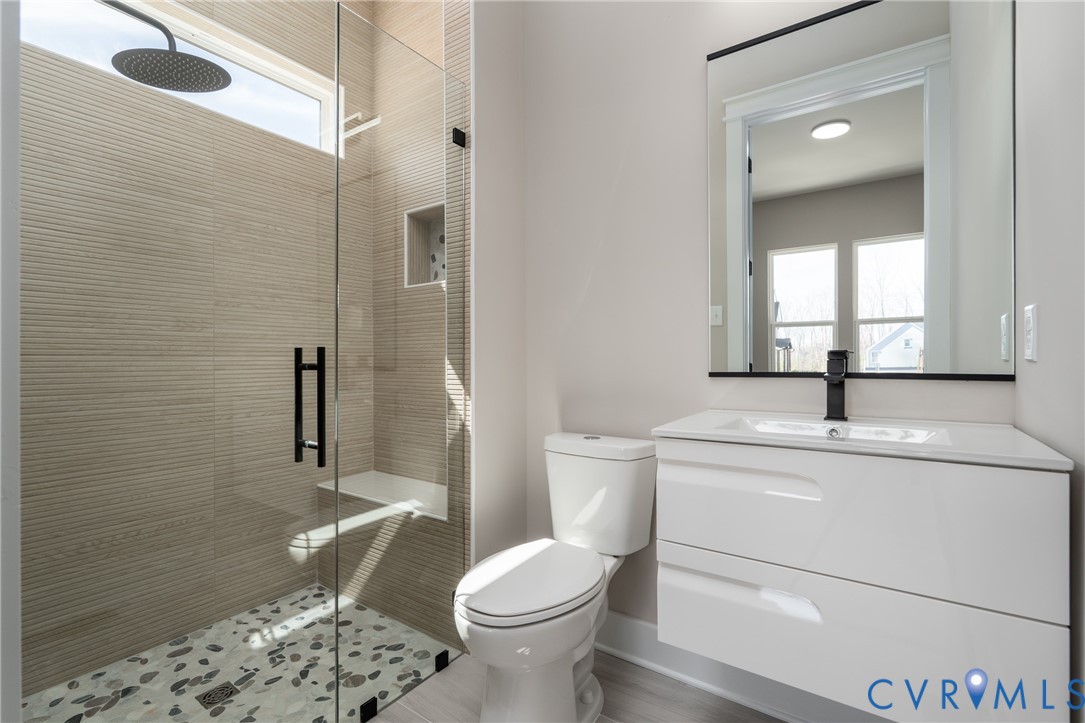 3536 Ampfield Way Midlothian, VA 23112 - Photo 9 of 49 a bathroom with a sink toilet and shower