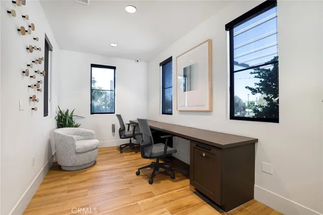 a view of a swimming pool with a lounge chair