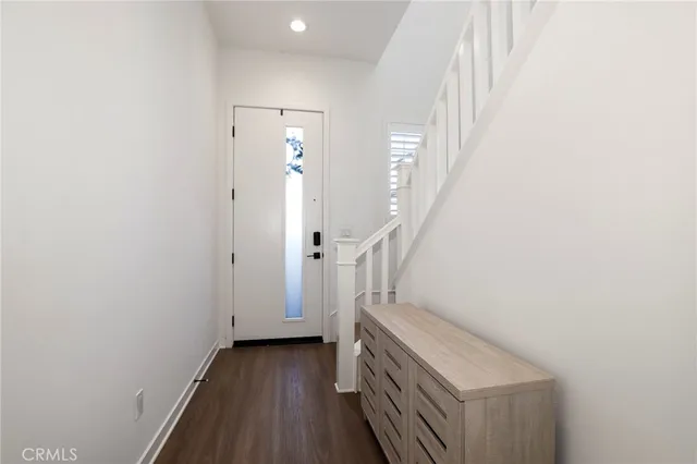 a kitchen with stainless steel appliances a refrigerator and a sink