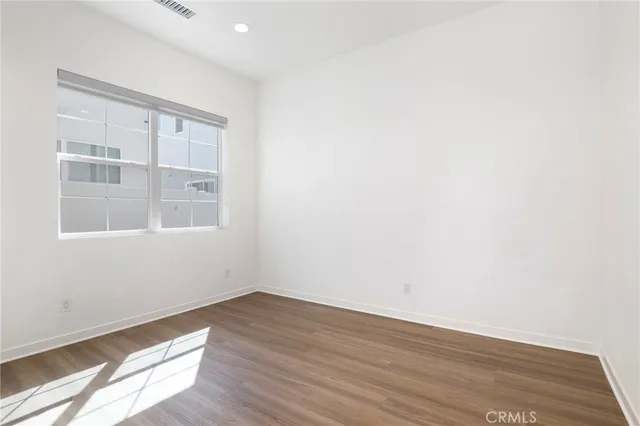 a bathroom with a sink a mirror and a toilet