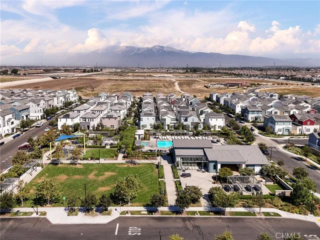 a picture of door with an open kitchen view