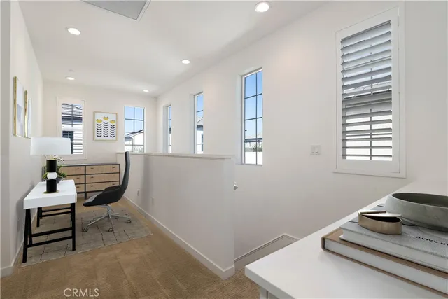 a living room with furniture and window