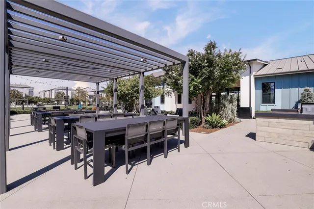 a living room with furniture window and wooden floor