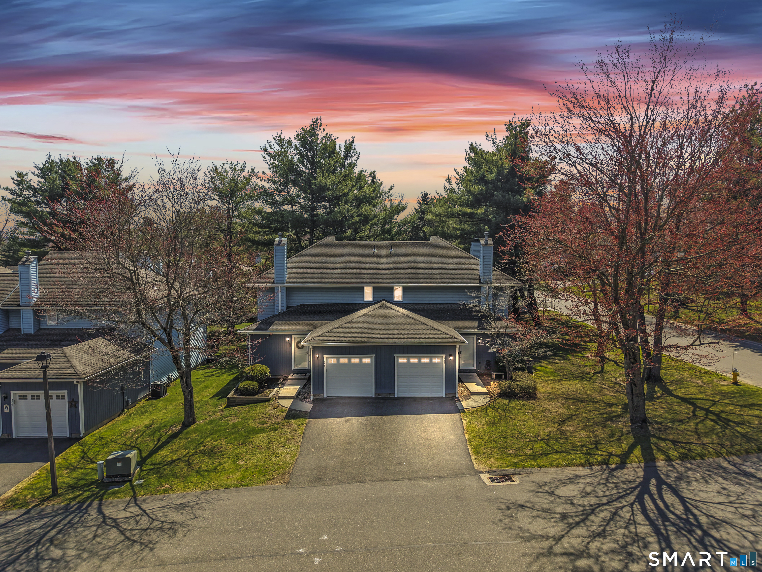 230 East Bass Lane, Unit 230 Suffield, CT 06078 - Photo 2 of 35 a house view with a garden space