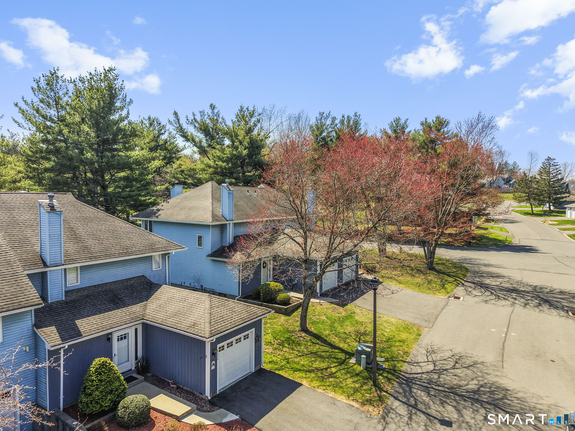 230 East Bass Lane, Unit 230 Suffield, CT 06078 - Photo 5 of 35 a view of house with outdoor space and sitting area